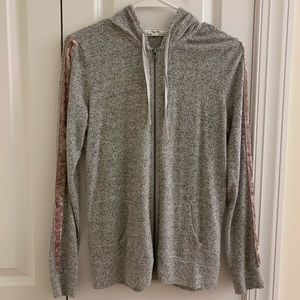 Grey zip-up sweater with velvet pink stripe